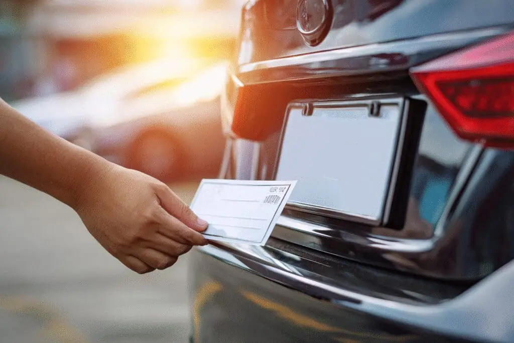 A quick guide for the FAQ on how to get temporary plates in Texas, showing a paper plate being attached to a car.