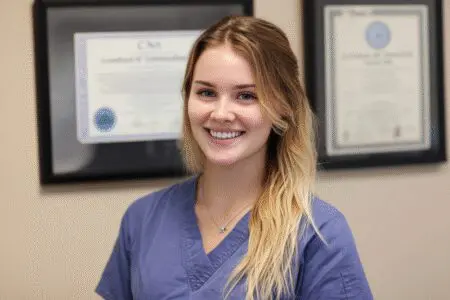 Informational visual explaining what a CNA license is, showing a Certified Nursing Assistant and their certificate